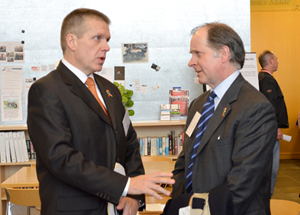 Photo of Tim Worke and Commissioner Zelle.